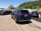 a lot of cars that are parked in the parking lot