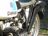 a motorcycle that is parked on the side of the road