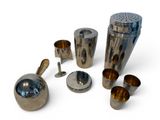 a lot of different metal items that are on the table