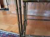 a picture of a pair of bamboo stools in a living room