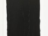 an image of a black piece of paper on a white surface
