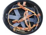 a close up of a helmet with leather straps on it