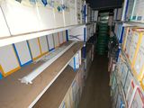 many boxes that are on the shelves in the store