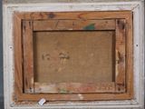 an old picture frame with a picture of a person on it