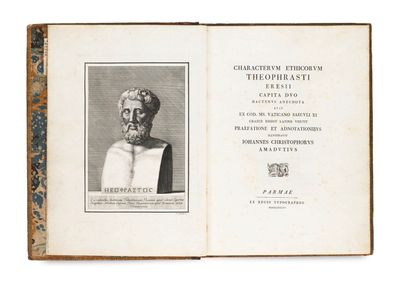 un vieux livre sur lequel figure l'image d'un homme barbu