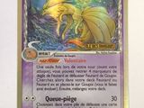 a close up of a card with a dragon on it