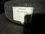 a piece of paper on the tire of a car