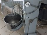 an image of a kitchen with a mixer and a bowl