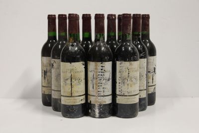 six bottles of wine are lined up in a row
