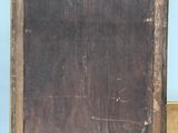 a picture of an old wooden frame on a table
