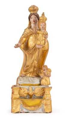 an image of a statue of a woman holding a child
