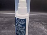 an image of a bottle of hand sanitizer on a table