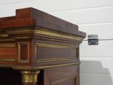 an image of a wooden desk with a drawer underneath it