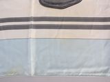 a towel with a pocket on it on a table