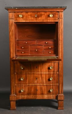 a wooden cabinet with drawers and a marble top