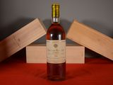 a bottle of wine that is sitting on a table