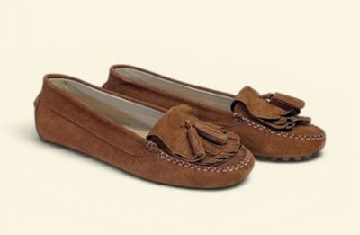 tan sued slippers with tassels on the toes