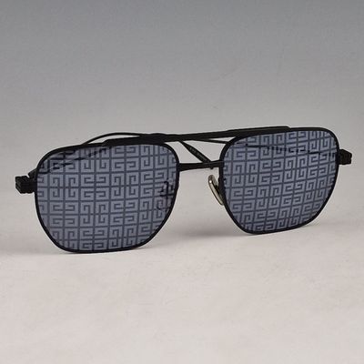 an image of a pair of sunglasses on a white surface