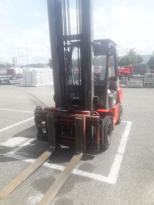 a forklift that is parked in a parking lot