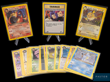 several pokemon cards are arranged in a row on a black background