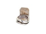 sterling silver ring with a rough stone and a polished band