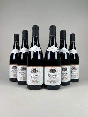 six bottles of wine are lined up in a row