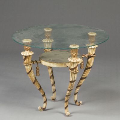 a table with a glass top that has candles on it