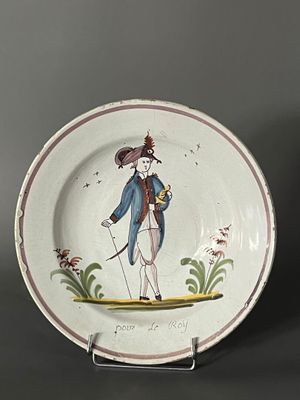 a plate with a picture of a man on it