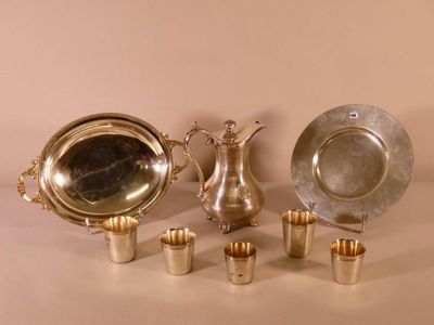 a lot of silver items that are on the table