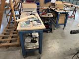 a workbench that has a lot of tools on it