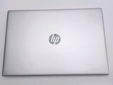 a laptop that is sitting on a white table