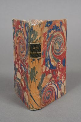 a small book that is sitting on a table