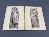 un livre ouvert sur lequel figure le dessin d'une femme en cape et d'un homme en cape