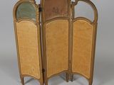an image of a three paneled screen with a mirror on top of it