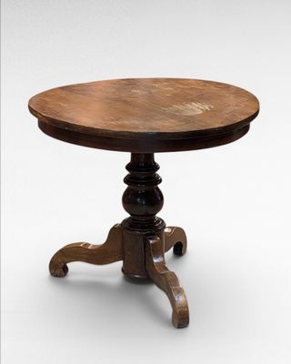a small table with a wooden top on a white background