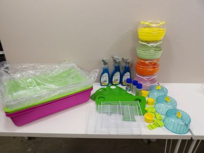 a white table with a bunch of plastic items on it