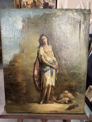 un tableau représentant un homme tenant un bébé, posé sur un chevalet