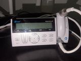 a remote control that is connected to a cell phone