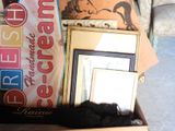 a wooden box filled with assorted items on the floor
