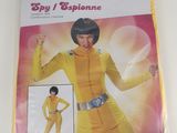 the costume is yellow and has a picture of a woman in a yellow outfit