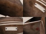 a close up of a purse with a zipper on it