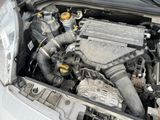 a car engine with the hood up and the hood down