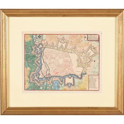 une vieille carte d'une ville dans un cadre doré sur fond blanc