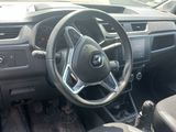a car dashboard with a steering wheel and a dash board