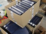 many boxes that are stacked on top of each other
