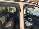 a white van with two seats in the back of it