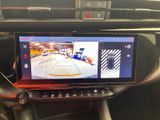 a picture of a car ' s dashboard with a camera mounted on it