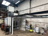 a garage with a lot of equipment in it