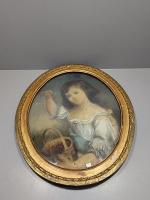 tableau représentant une femme avec un panier de fleurs, dans un cadre doré