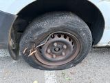 a tire that has fallen off of a car